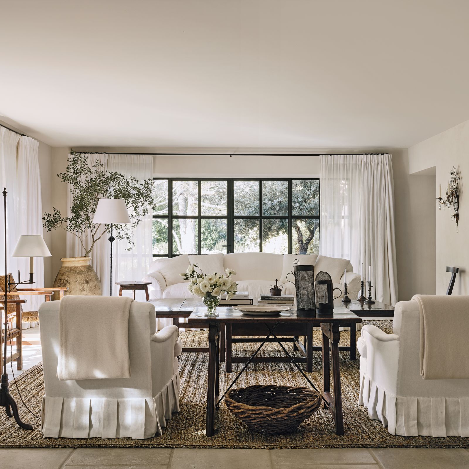 A refined Provençal house layered with natural materials and antiques